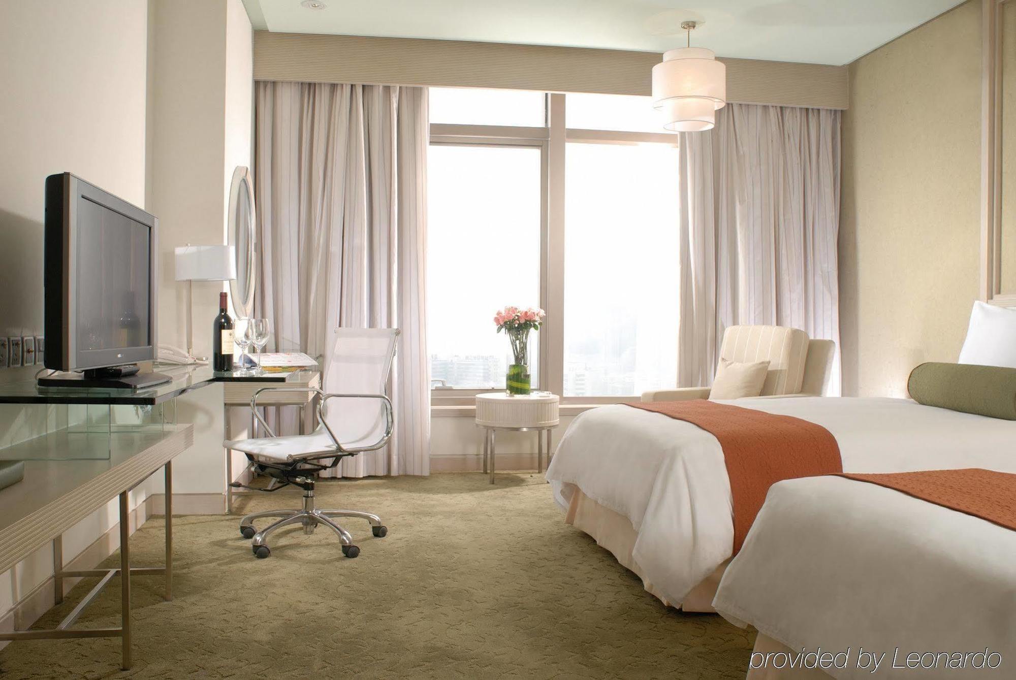 Hotel Nikko تيانجين الغرفة الصورة A room at the hotel